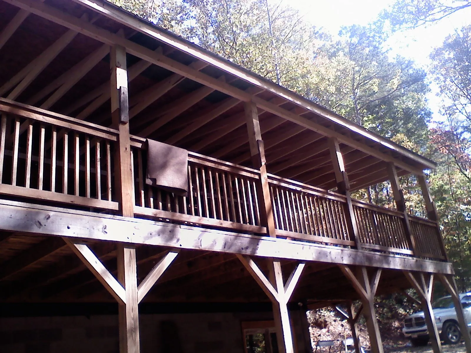 Timber framing under a new elevated porch and deck — Roof Leak Repair in Elk Mound by Roofing Brothers